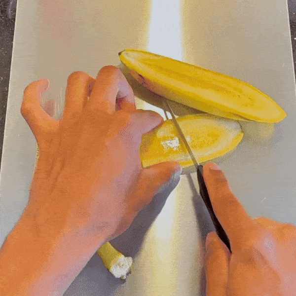 Two Katori titanium cutting boards displayed on a kitchen counter